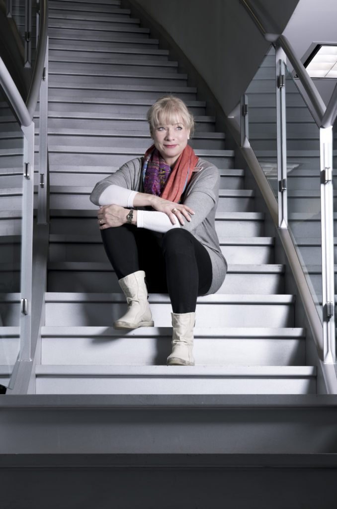 Anke Effey sitting on stairs